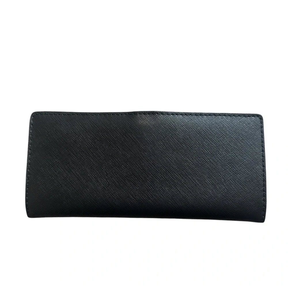 The Michael Kors Jet Set Travel Large Saffiano Leather wallet